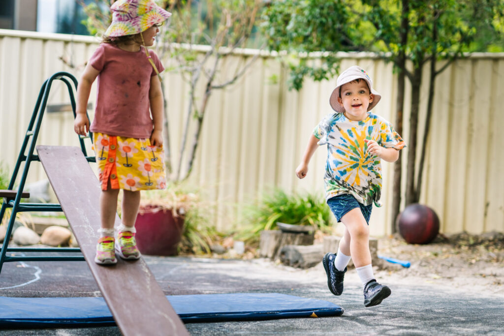 Children playing outside at Alfred Childcare in Melbourne