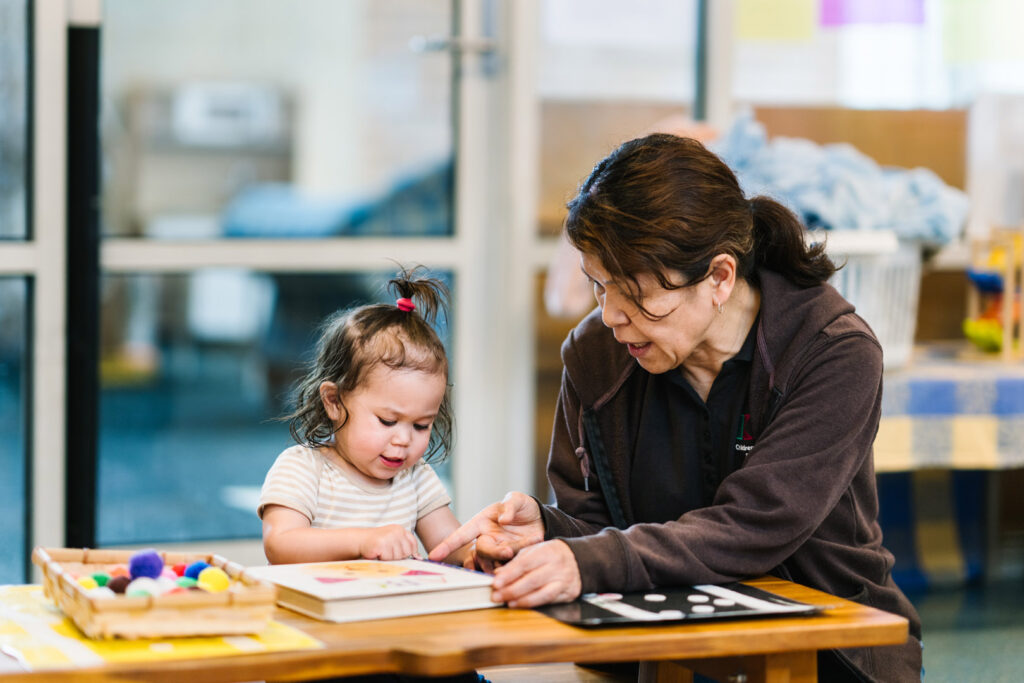 Educator interacting with child at Alfred Childcare in Melbourne