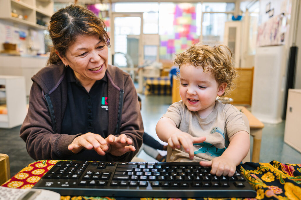 Educator interacting with child at Alfred Childcare in Melbourne