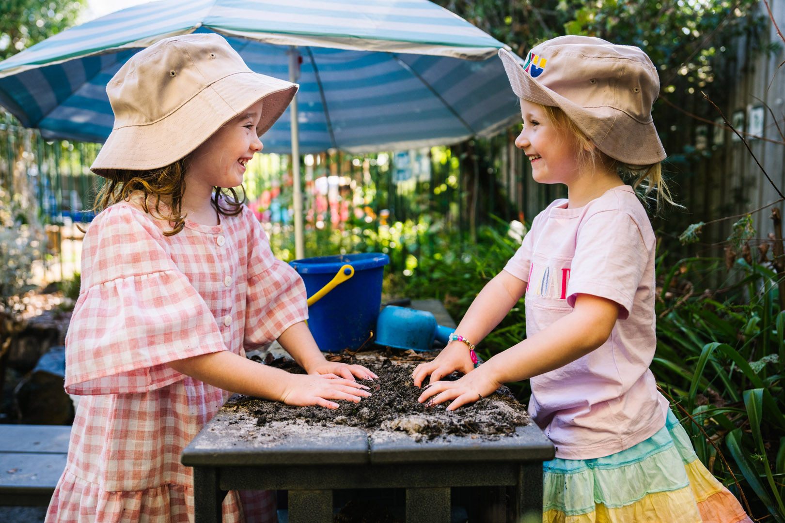Children playing outdoors at childcare in Armstrong Creek