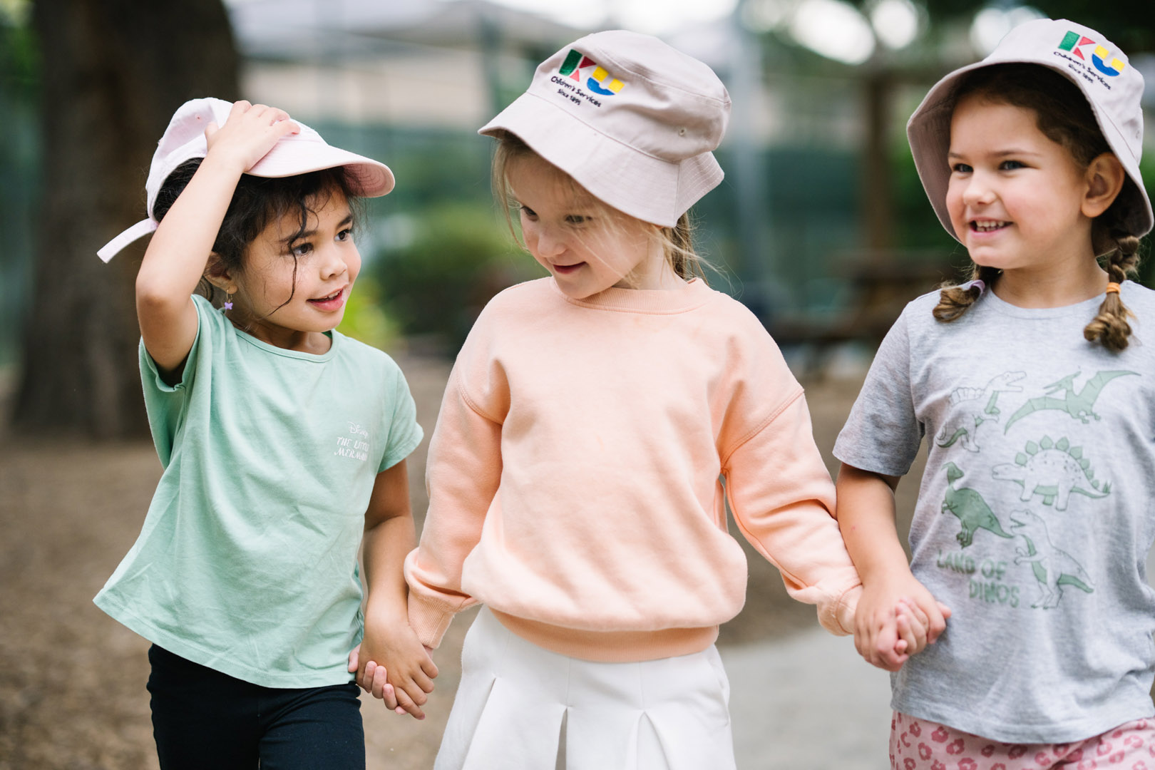 Children holding hands at Armstrong Creek kinder
