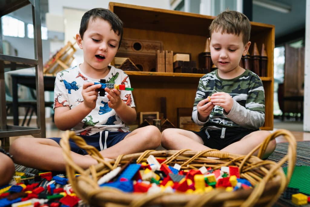 Children playing with Lego bricks at Kooinda Workbase Childcare