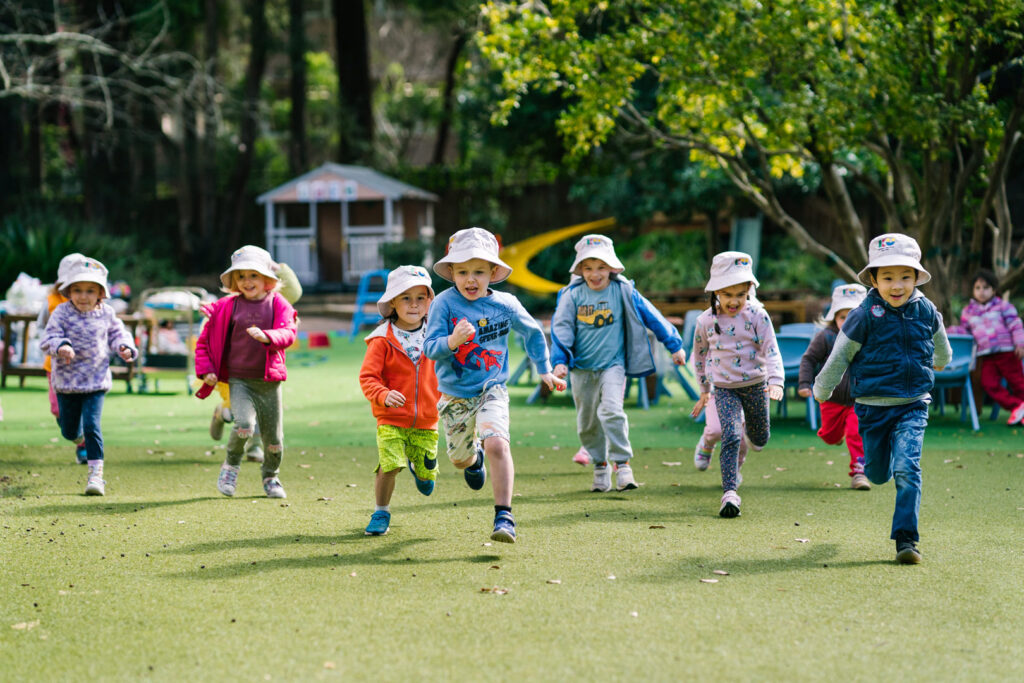 Children running at KU Cheltenham Memorial childcare