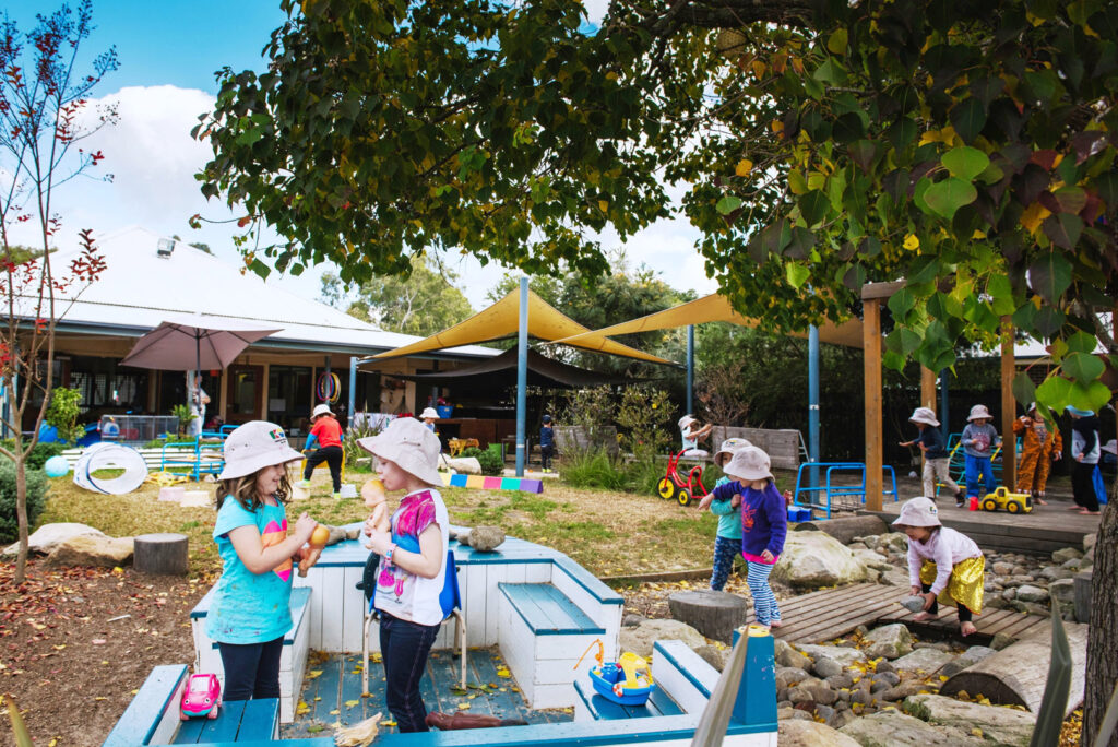 Children playing outdoors at KU Cobbitty childcare