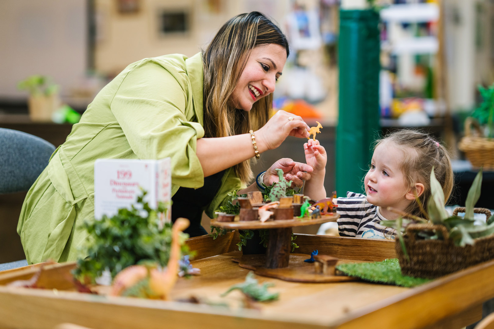 Child and educator engaged in play at Darlington childcare