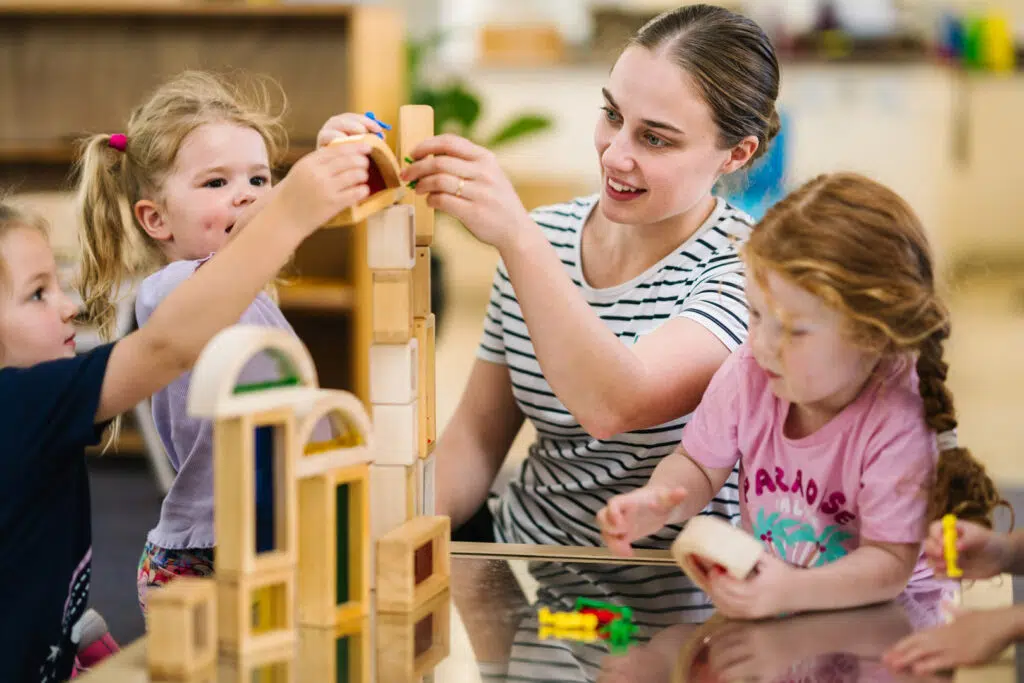 Children playing blocks with educator at FW Kerr Kindergarten in Ferntree Gully