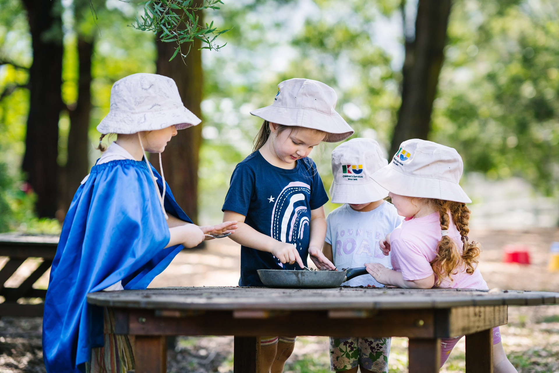 Children playing outdoors at KU FW Kerr Kindergarten in Ferntree Gully