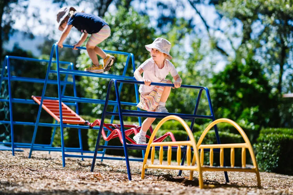 Children playing outdoors at FW Kerr Kindergarten in Ferntree Gully