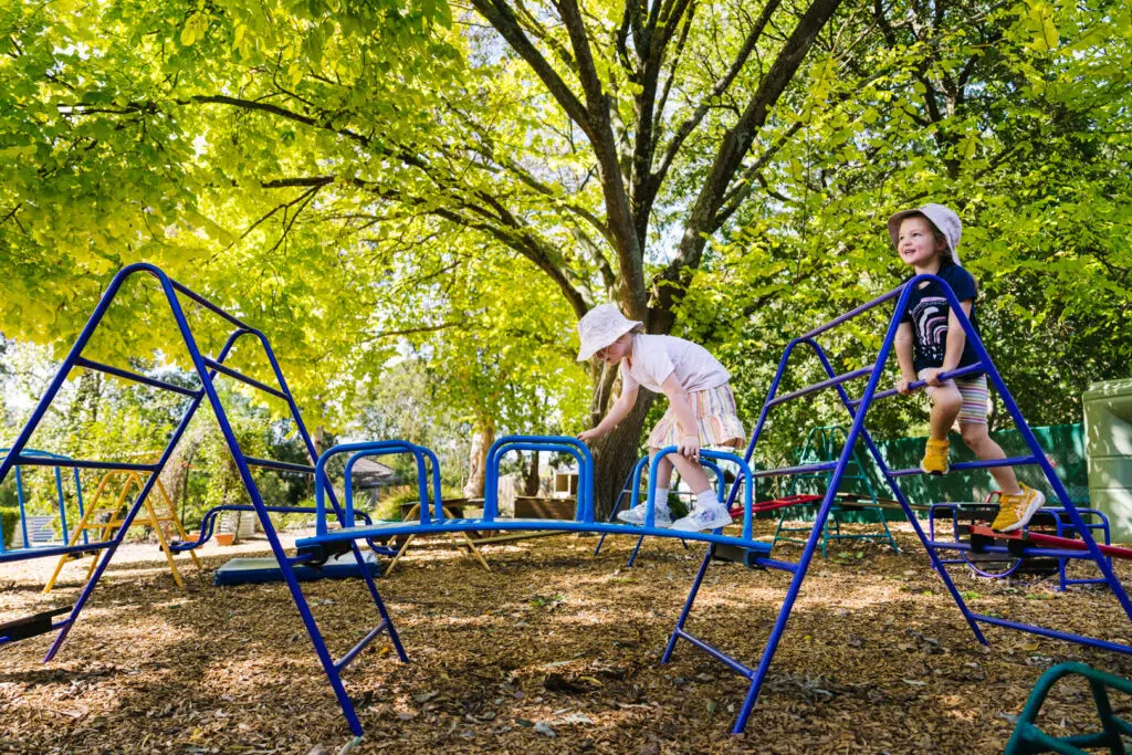 Children playing outdoors at FW Kerr Kindergarten in Ferntree Gully