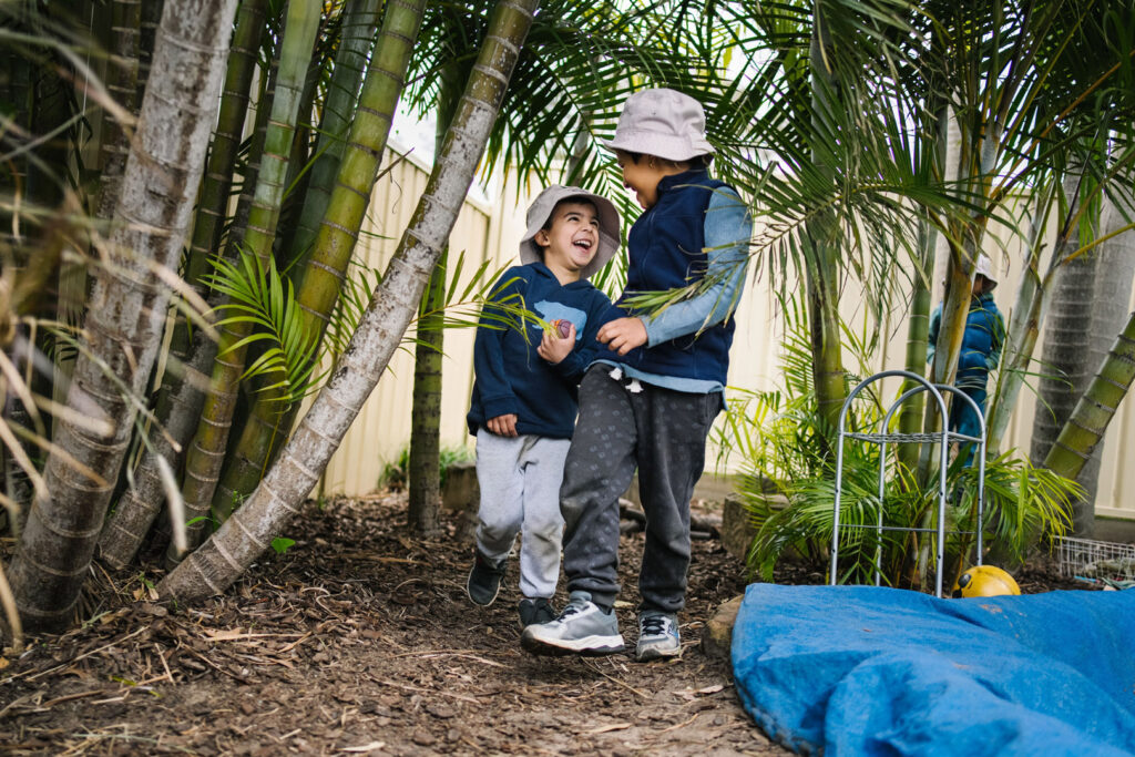 Children playing outdoors at KU Gwynneville childcare