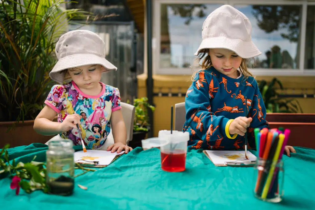Children painting at KU Lance childcare