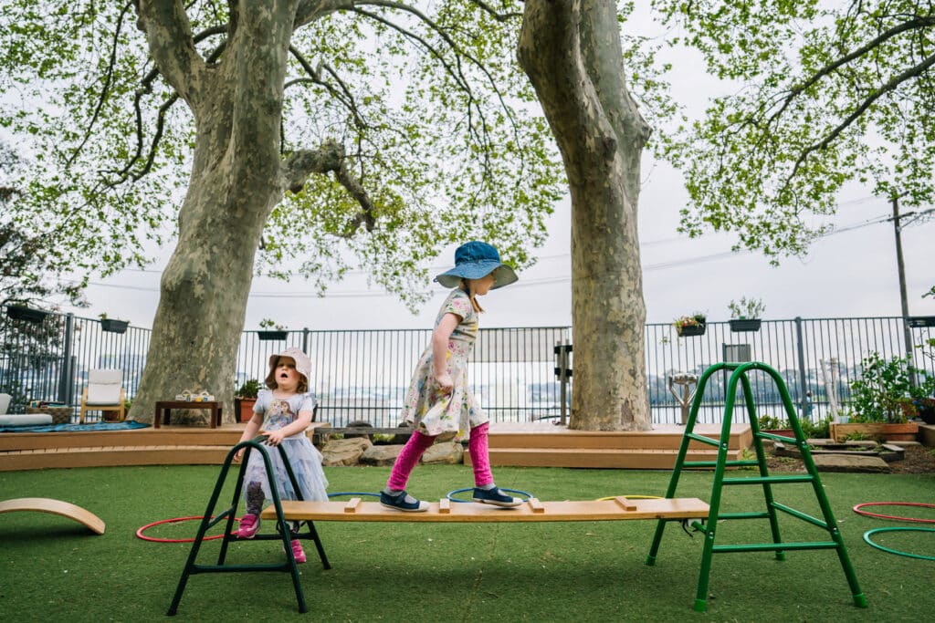 Children on the outdoor equipment at KU Lance childcare
