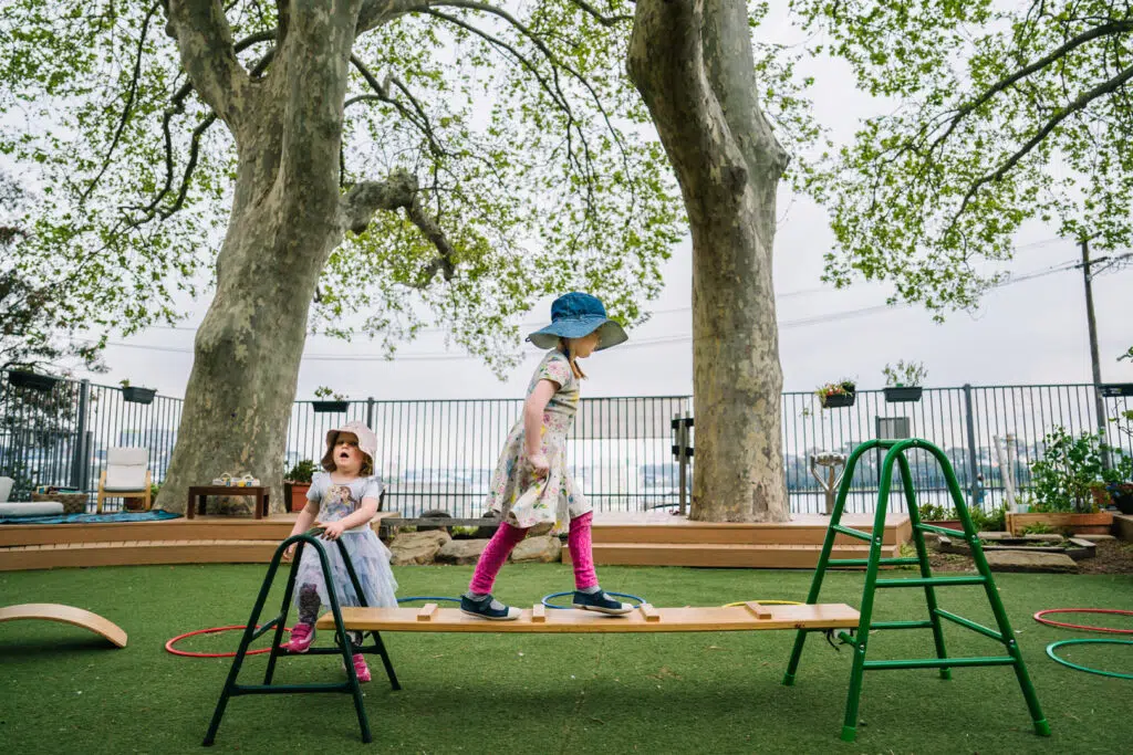 Children on the outdoor equipment at KU Lance childcare