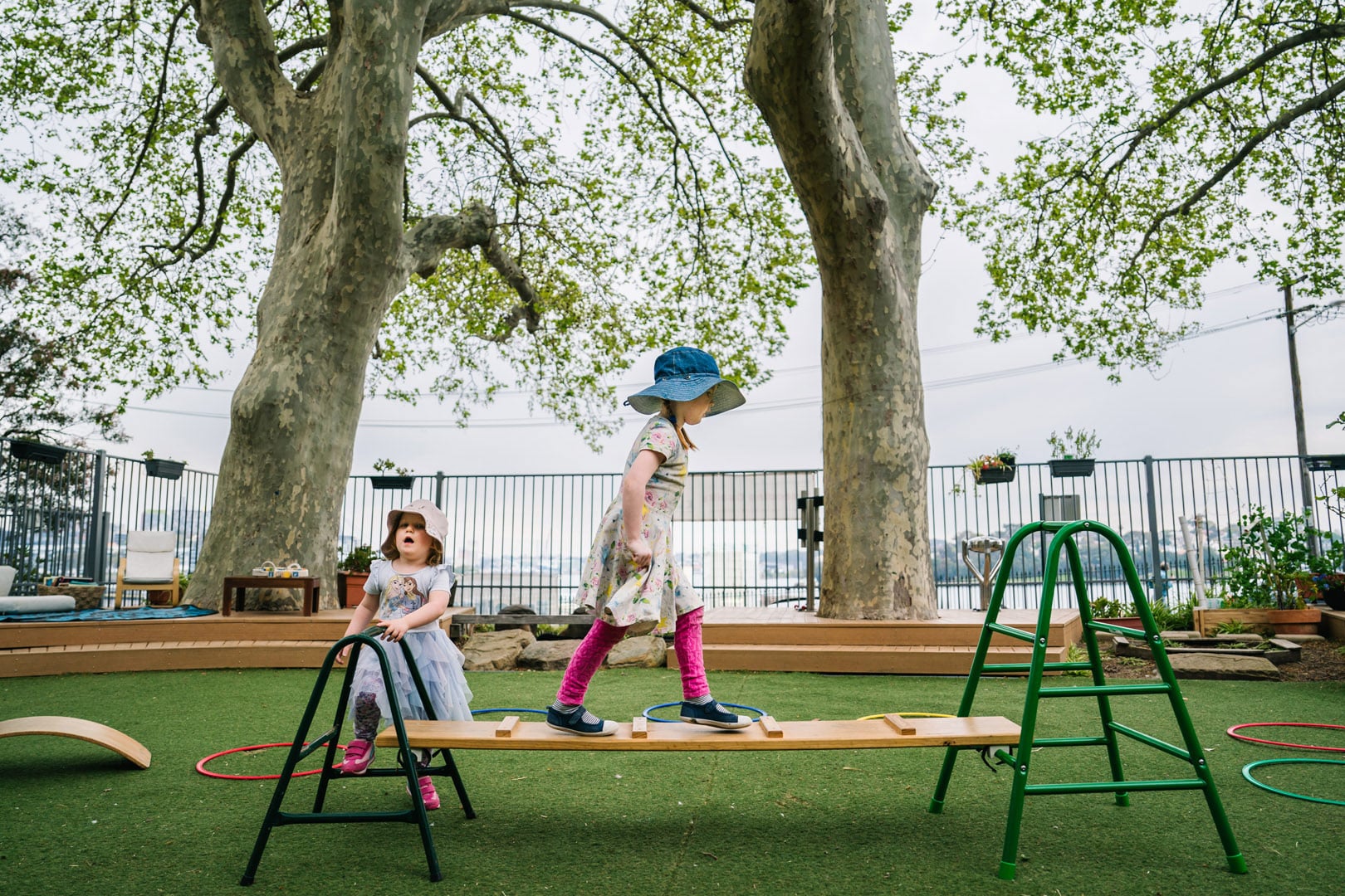 Children on the outdoor equipment at KU Lance childcare