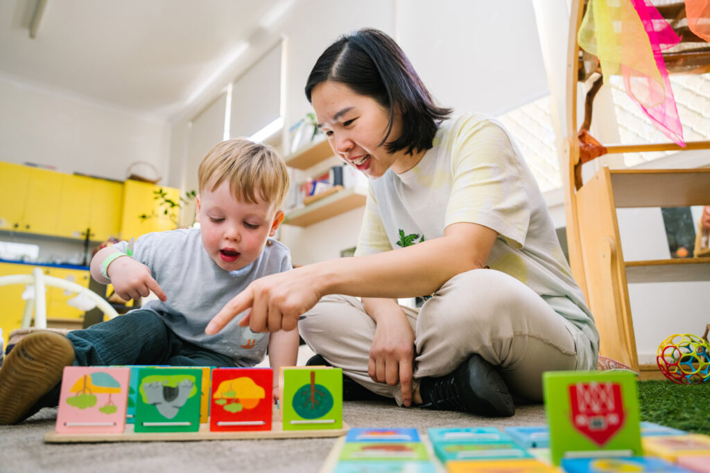 Child and educator playing at Newtown childcare Carillon Avenue Children's Centre