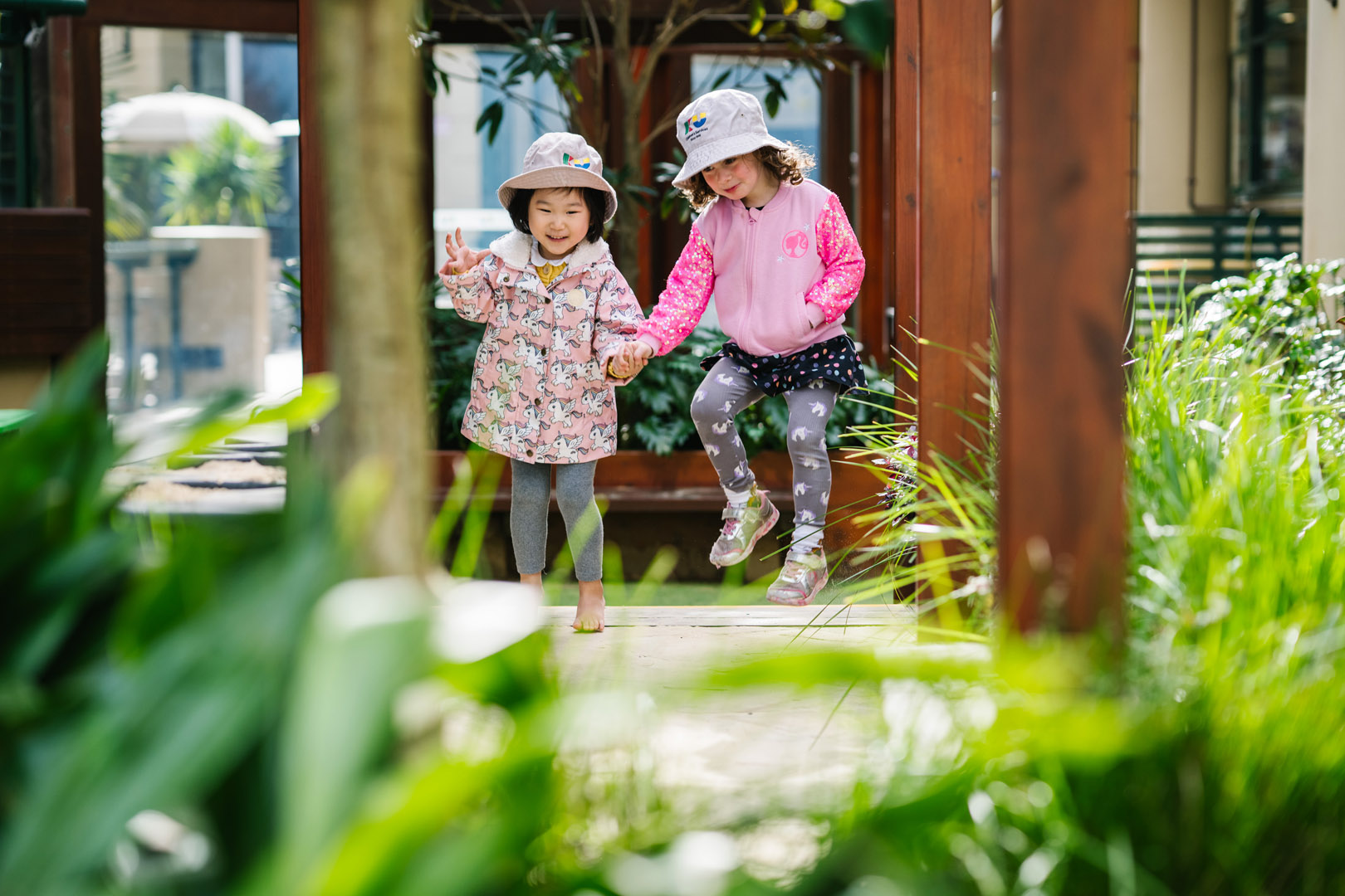 Children playing outdoors at North Sydney Childcare