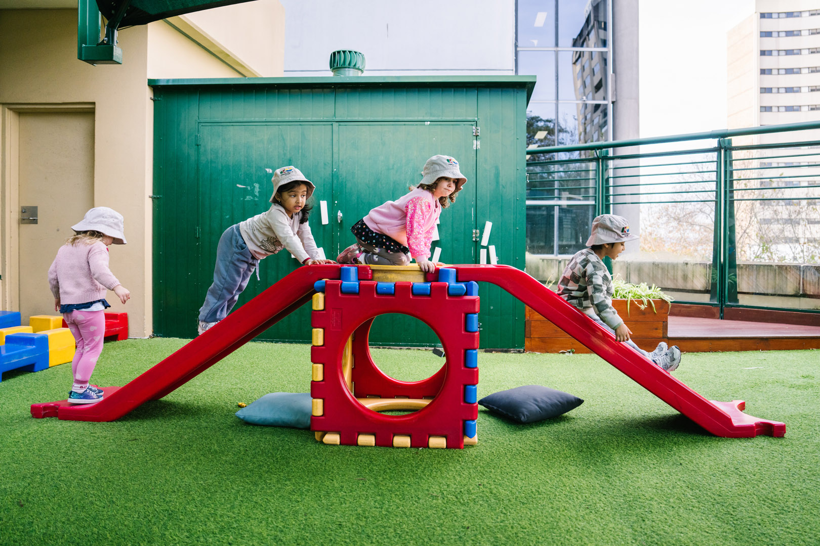 Children playing outdoors at North Sydney Childcare