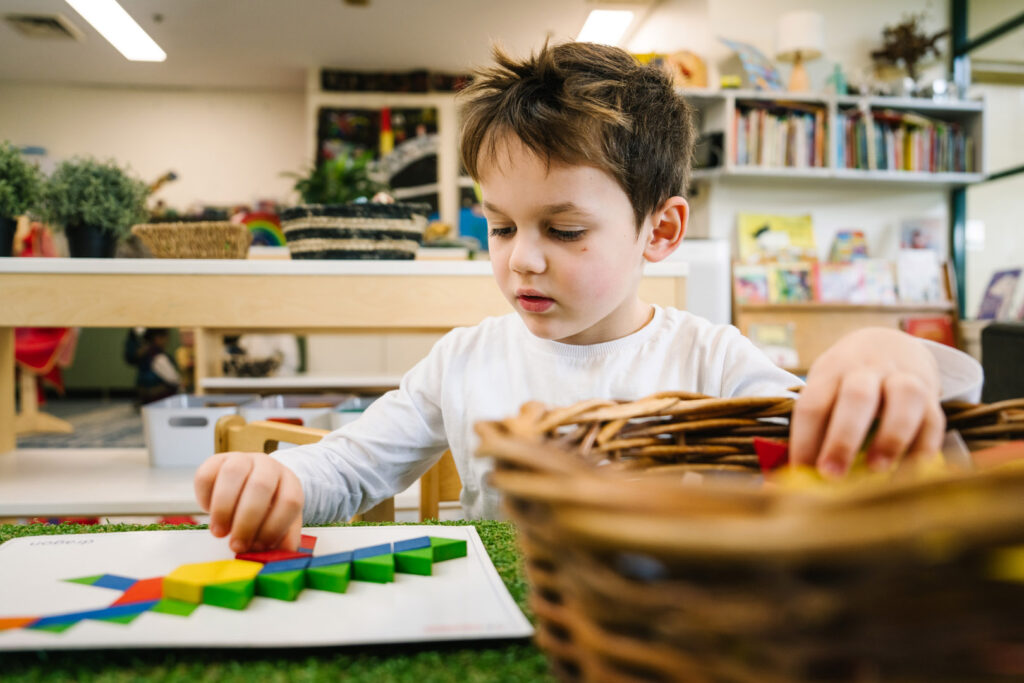 Child engaged in puzzle play at North Sydney Childcare
