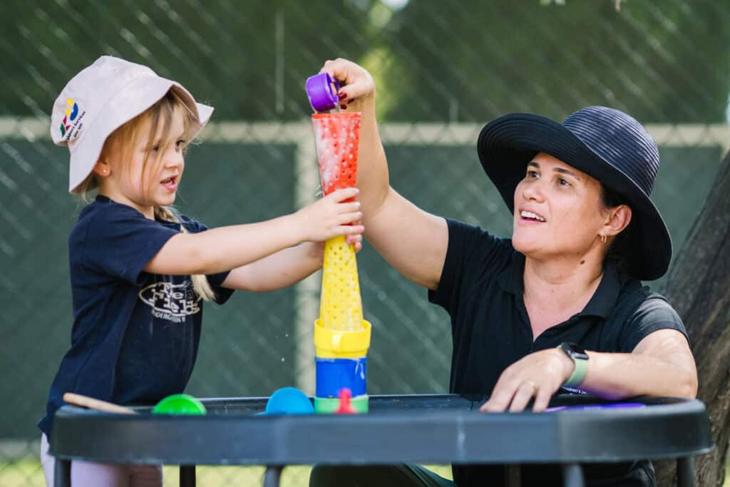 Educator interacting with child at KU The Fields childcare in Rowville