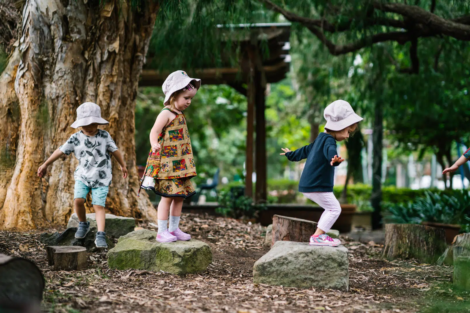 Children playing outdoors at KU Rushcutters Bay childcare