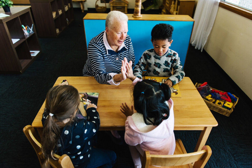 KU Shalvey childcare educator interacting with children