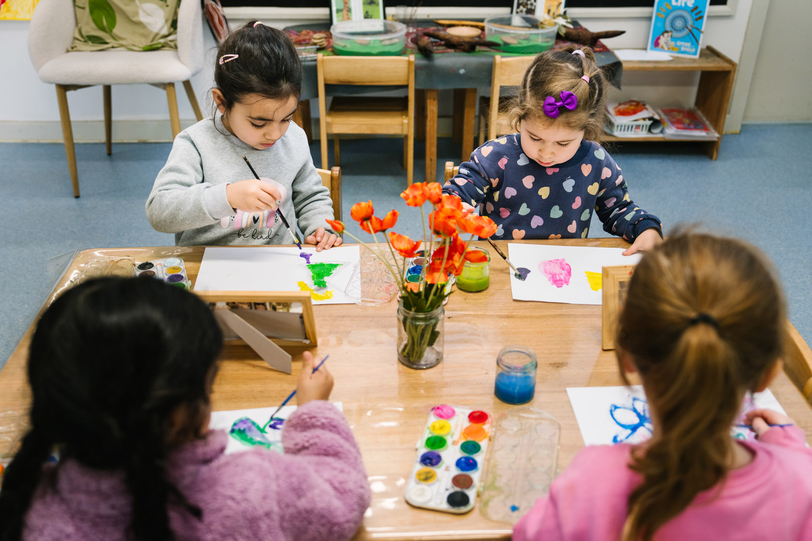 Children painting at South Turramurra childcare