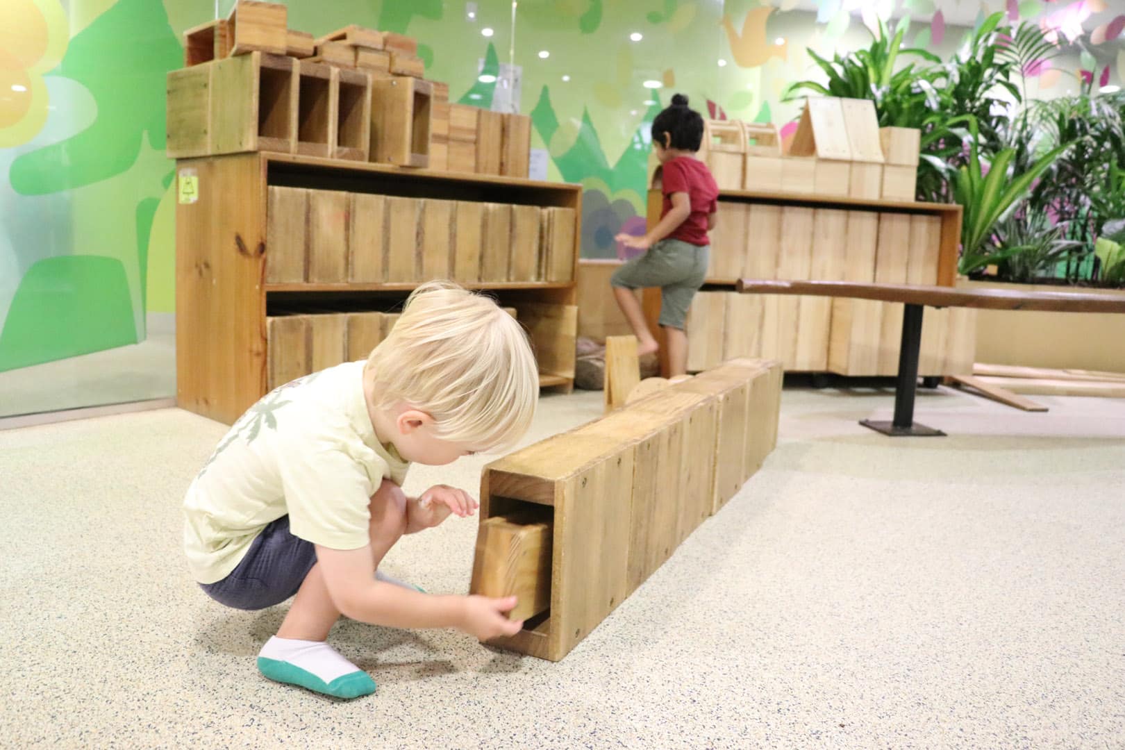 Children playing with blocks at KU Treehouse childcare in Sydney CBD