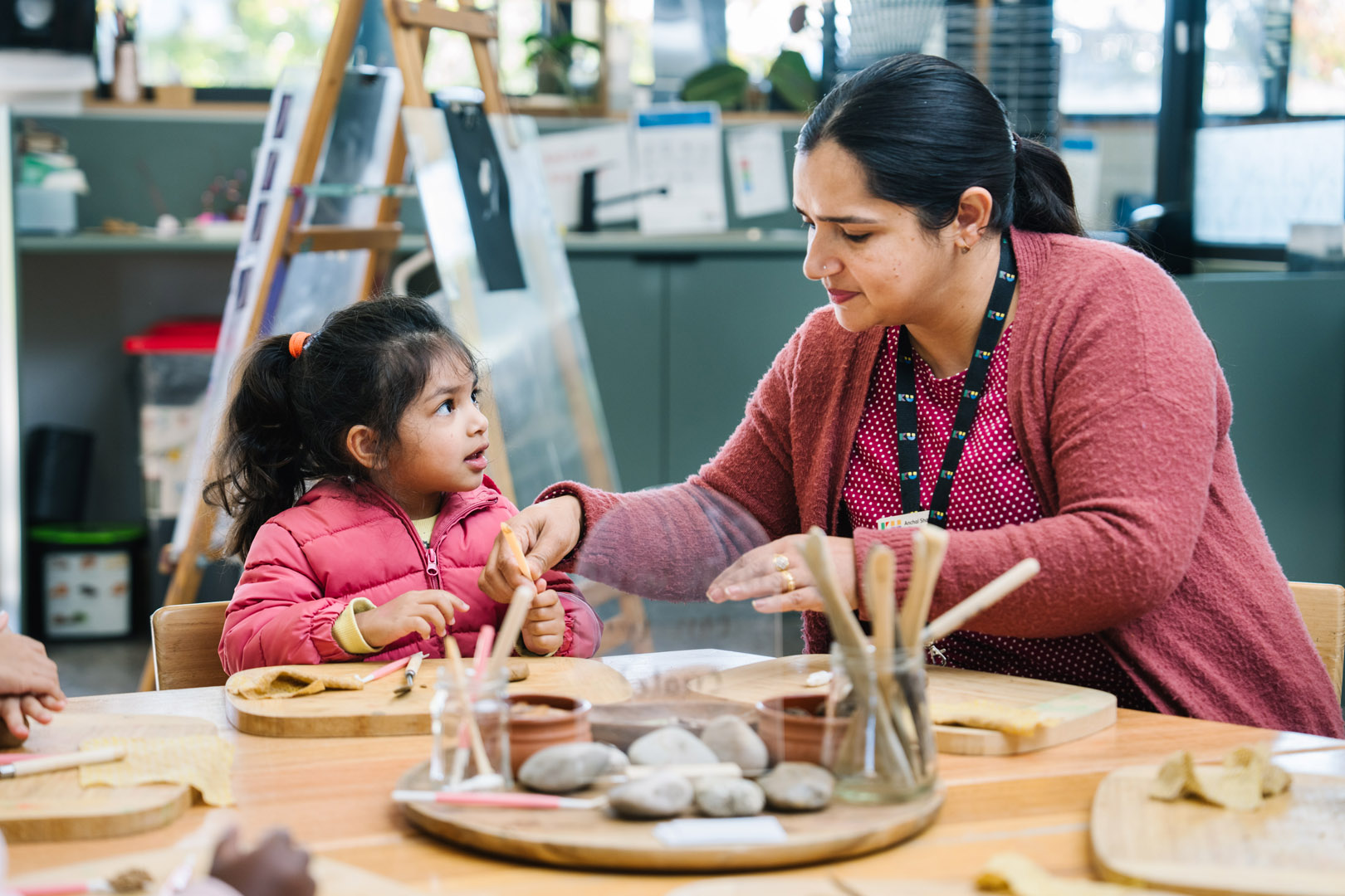 Child and educator engaged in play at Dianella Kindergarten in Tarneit