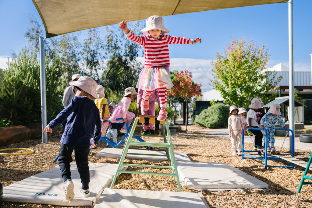 Children on playing equipment at Dianella Kinder in Tarneit