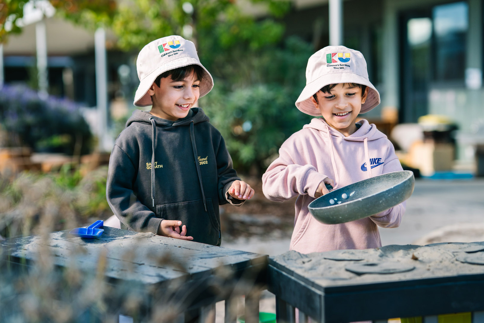 Children in outdoor kitchen at Dianella Kinder in Tarneit