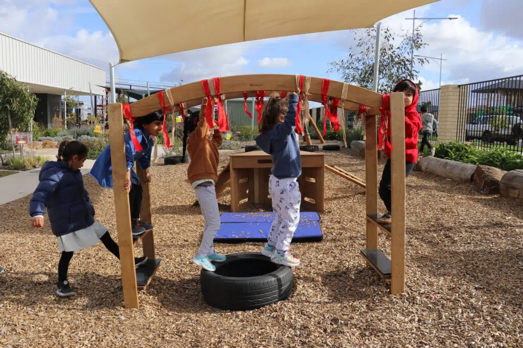 Children playing on the equipment at KU Dianella childcare