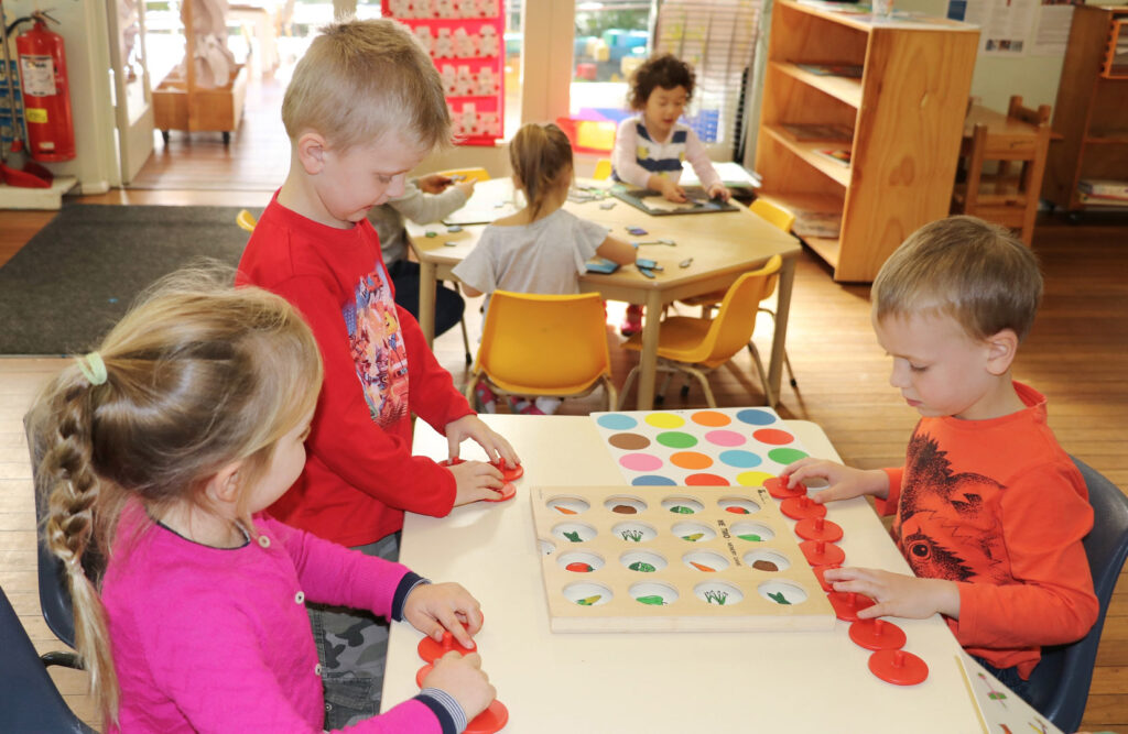 Children playing a matching game at KU Wahroonga childcare