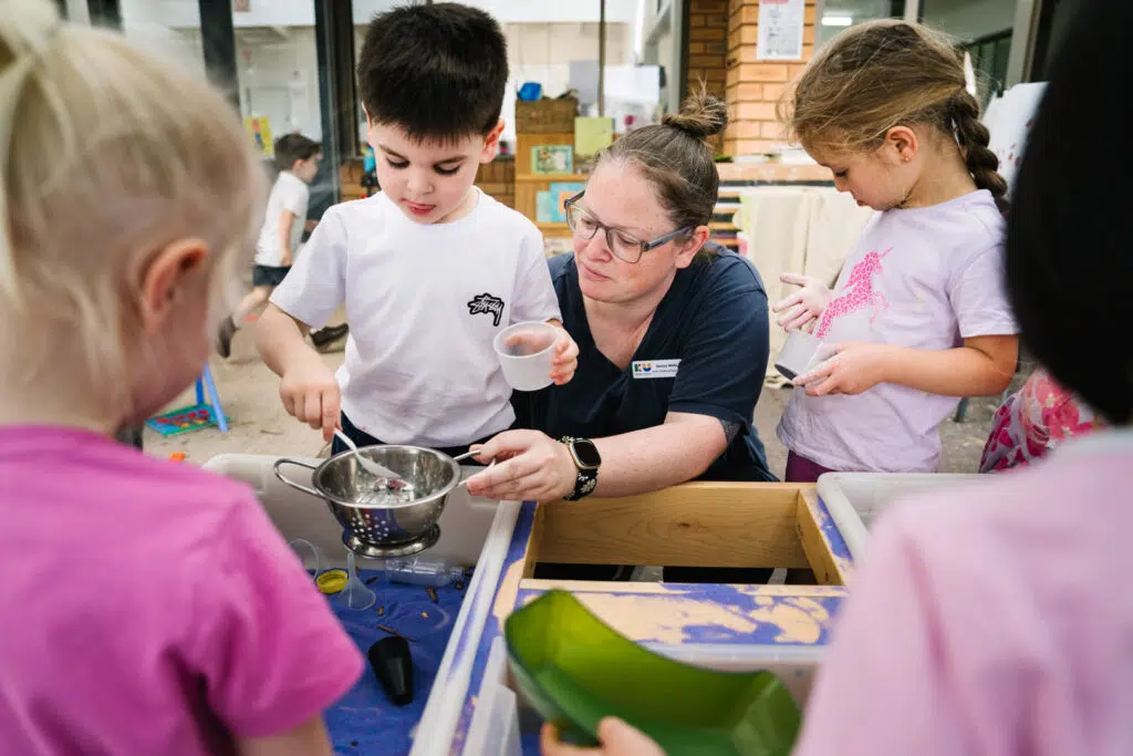 Educator interacting with children at KU Riddell Road Childcare in Wantirna South