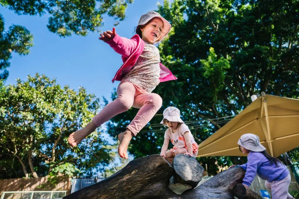 Child playing outdoors at Waterloo childcare