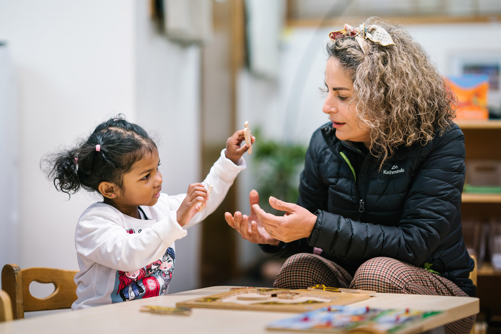 Educator engaged with child at West Lindfield Childcare