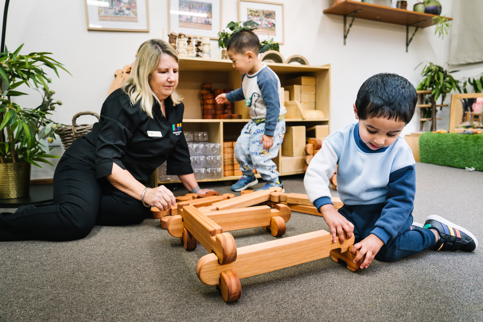 Educator engaged with children at West Lindfield Childcare