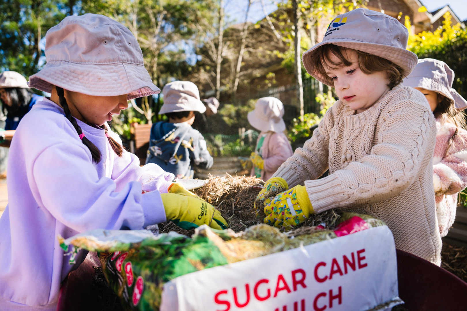 Children composting at West Lindfield Childcare