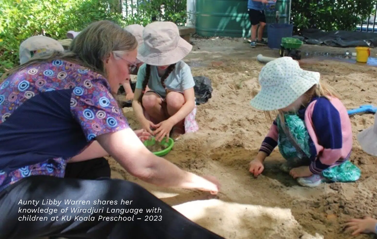 Commitment to Aboriginal and Torres Strait Islander Peoples 26 https://www.ku.com.au/wp-content/uploads/2024/09/Aunty-Libby-Warren-sharing-her-knowledge-of-Wiradjuri-Language-with-children-at-KU-Koala-Preschool_2023_website2.jpg