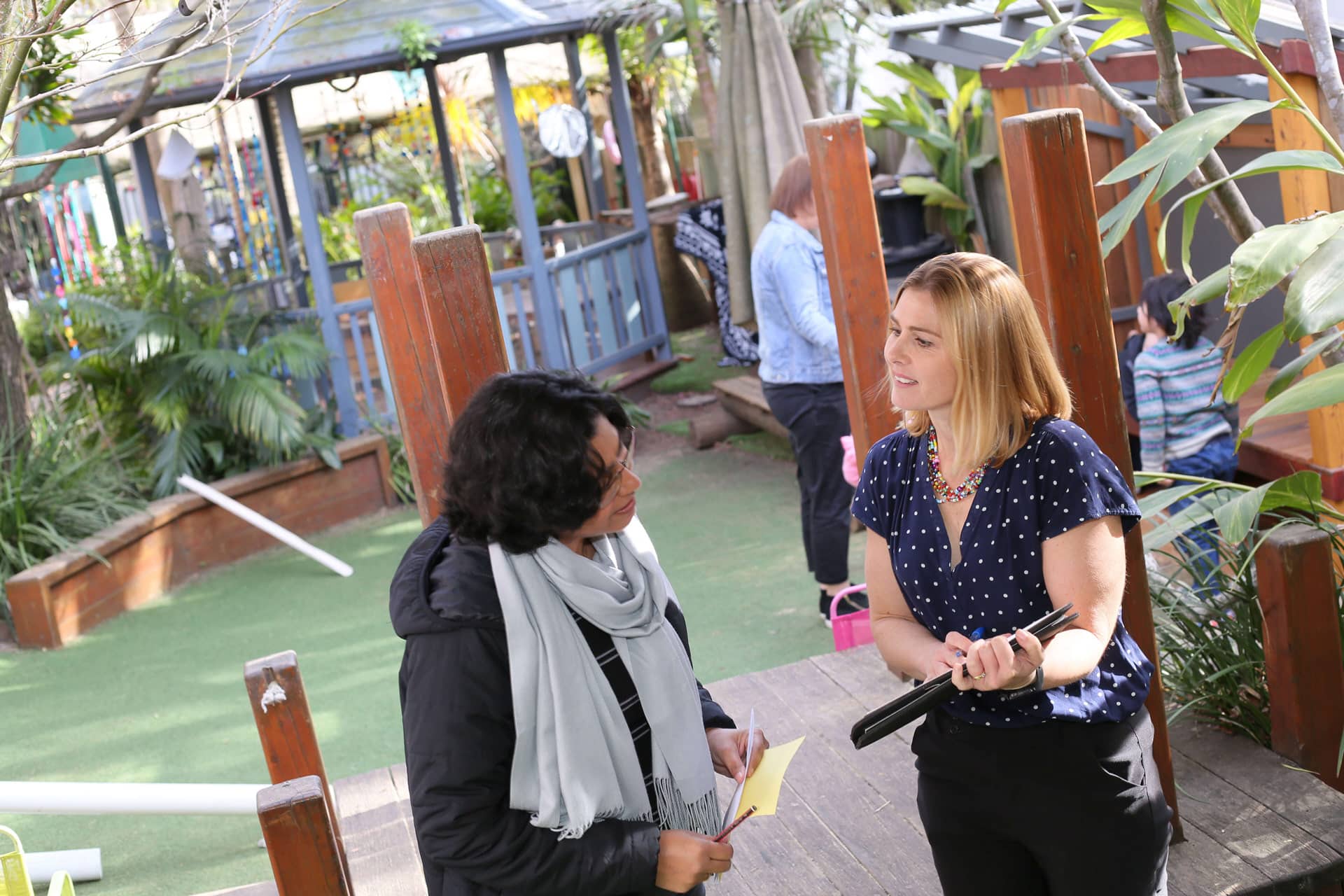 KU Sector Capacity Building Program 24 https://www.ku.com.au/wp-content/uploads/2024/12/Bel-and-educator-talking-outside-with-resource-optimised.jpg