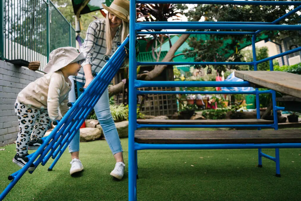 Child climbing at KU Carillon childcare