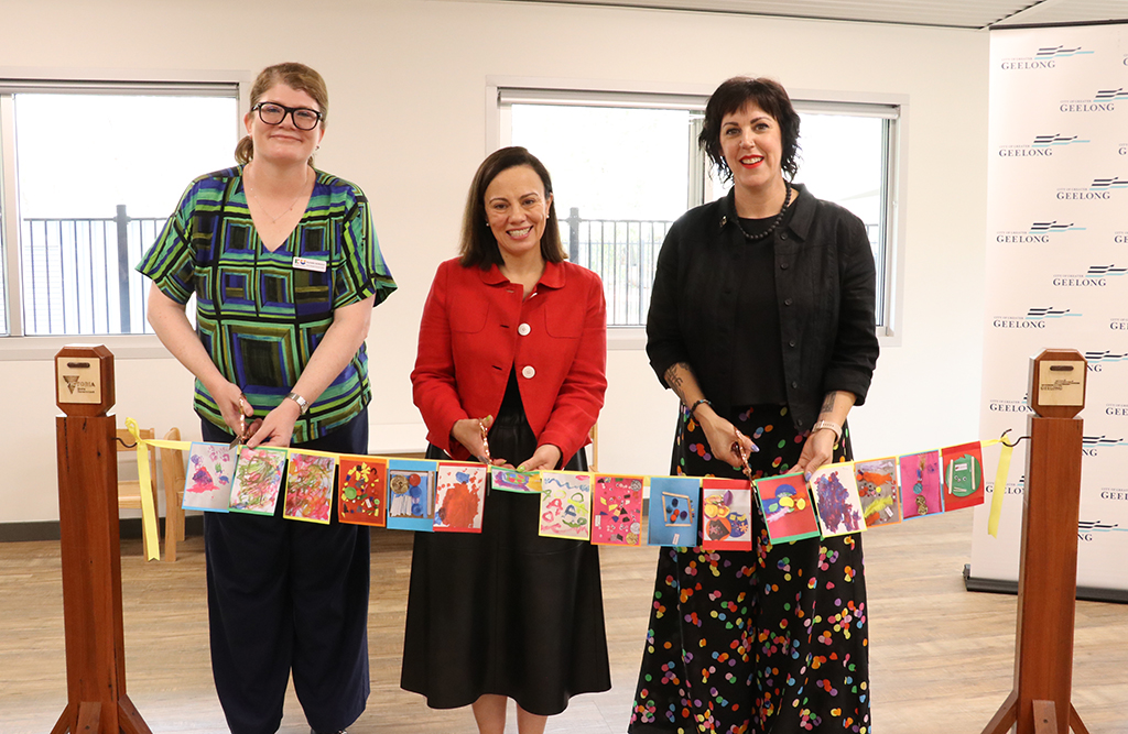 KU celebrates opening of two new Armstrong Creek early learning services 11 Cutting the bunting made from artworks by KU children are Victorian Minister for Children, the Hon Lizzie Blandthorn MP, City of Greater Geelong Councillor, Emma Sinclair (Charlemont Ward) and KU’s Senior Manager, Education Quality, Rachelle McMahon.