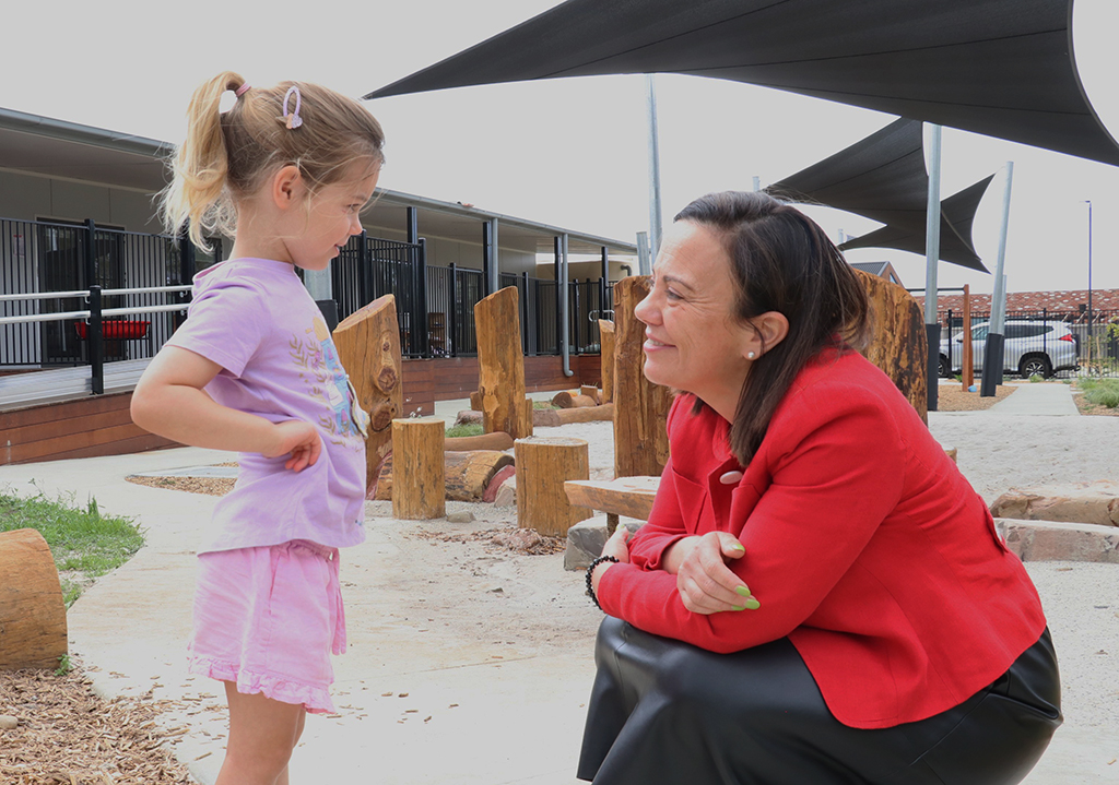 KU celebrates opening of two new Armstrong Creek early learning services 9 A child attending KU (with consent to participate) talking with Victorian Minister for Children, the Hon Lizzie Blandthorn MP.