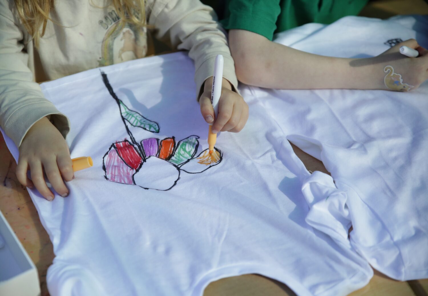 KU Crusader Preschool celebrates 80th anniversary 8 Child drawing on t-shirt